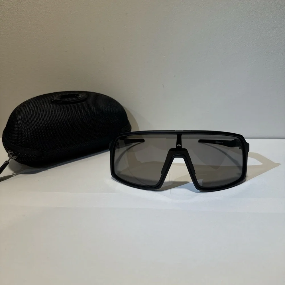 Oakley Black on Black Sutro sunglasses. Comes with case and bag